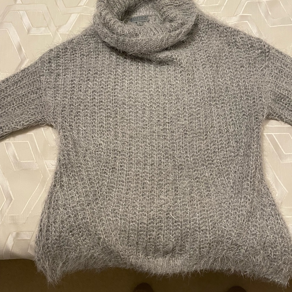 Soft, cuddly sweater. Beautiful knit fabric